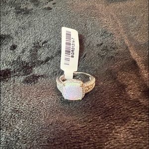 Beautiful sterling silver lab created fire opal and cz ring. Size 7.